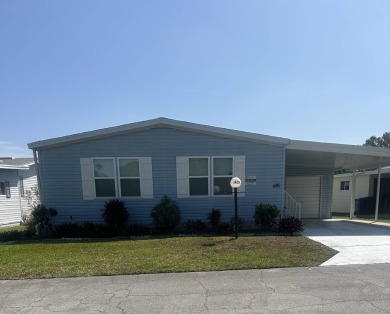 Escape to serenity in this charming 2-bedroom home, boasting on Schalamar Creek Golf and Country Club in Florida - for sale on GolfHomes.com, golf home, golf lot