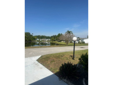 Escape to serenity in this charming 2-bedroom home, boasting on Schalamar Creek Golf and Country Club in Florida - for sale on GolfHomes.com, golf home, golf lot