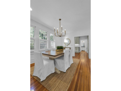 This fully renovated 4 bedroom, 2  1/2  bathroom bungalow blends on Greenville Country Club in South Carolina - for sale on GolfHomes.com, golf home, golf lot
