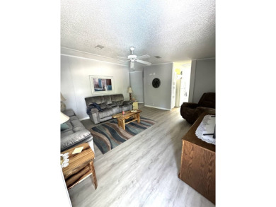 Escape to serenity in this charming 2-bedroom home, boasting on Schalamar Creek Golf and Country Club in Florida - for sale on GolfHomes.com, golf home, golf lot
