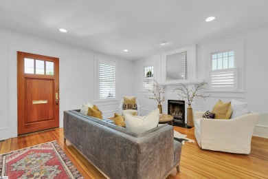 This fully renovated 4 bedroom, 2  1/2  bathroom bungalow blends on Greenville Country Club in South Carolina - for sale on GolfHomes.com, golf home, golf lot