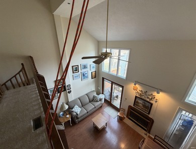 This inviting Lake Monroe condo features soaring ceilings and on The Eagle Pointe Golf Resort in Indiana - for sale on GolfHomes.com, golf home, golf lot