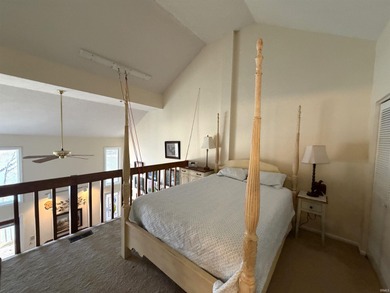 This inviting Lake Monroe condo features soaring ceilings and on The Eagle Pointe Golf Resort in Indiana - for sale on GolfHomes.com, golf home, golf lot