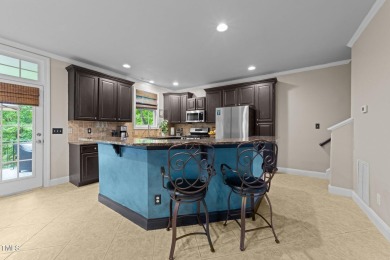 Spacious, elegant end-unit townhome with golf course view in on TPC at Wakefield Plantation in North Carolina - for sale on GolfHomes.com, golf home, golf lot