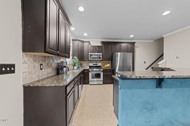 Spacious, elegant end-unit townhome with golf course view in on TPC at Wakefield Plantation in North Carolina - for sale on GolfHomes.com, golf home, golf lot
