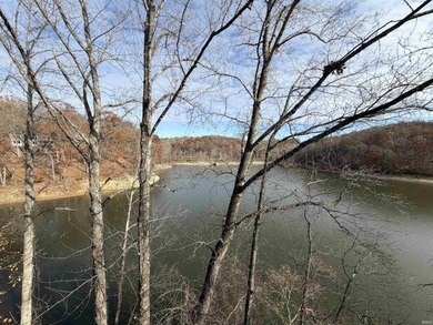 This inviting Lake Monroe condo features soaring ceilings and on The Eagle Pointe Golf Resort in Indiana - for sale on GolfHomes.com, golf home, golf lot