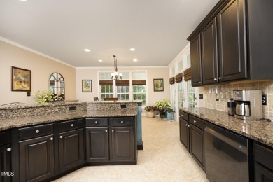 Spacious, elegant end-unit townhome with golf course view in on TPC at Wakefield Plantation in North Carolina - for sale on GolfHomes.com, golf home, golf lot