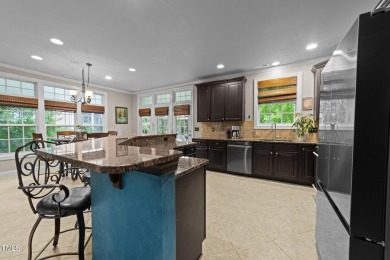 Spacious, elegant end-unit townhome with golf course view in on TPC at Wakefield Plantation in North Carolina - for sale on GolfHomes.com, golf home, golf lot