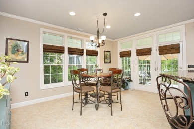 Spacious, elegant end-unit townhome with golf course view in on TPC at Wakefield Plantation in North Carolina - for sale on GolfHomes.com, golf home, golf lot