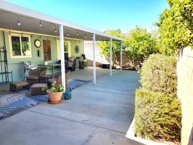 Presenting this well-maintained 3-bedroom, 2-bath home built in on Palm Desert Greens Country Club in California - for sale on GolfHomes.com, golf home, golf lot