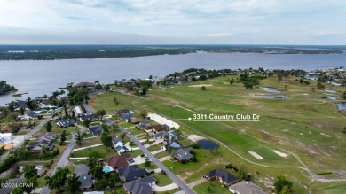 With 4 bedrooms PLUS an office and huge bonus space, this home on Panama Country Club in Florida - for sale on GolfHomes.com, golf home, golf lot
