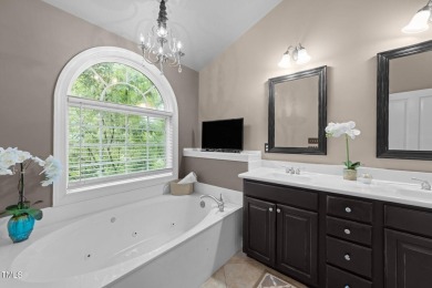 Spacious, elegant end-unit townhome with golf course view in on TPC at Wakefield Plantation in North Carolina - for sale on GolfHomes.com, golf home, golf lot