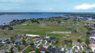 With 4 bedrooms PLUS an office and huge bonus space, this home on Panama Country Club in Florida - for sale on GolfHomes.com, golf home, golf lot