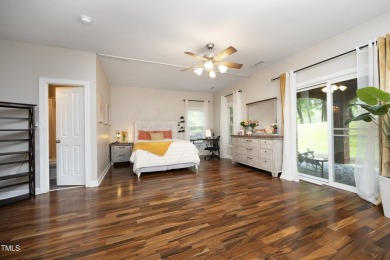 Spacious, elegant end-unit townhome with golf course view in on TPC at Wakefield Plantation in North Carolina - for sale on GolfHomes.com, golf home, golf lot