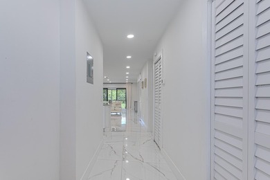 Stunning second-story condo in the prestigious Boca Lago Golf & on Boca Lago Golf and Country Club in Florida - for sale on GolfHomes.com, golf home, golf lot