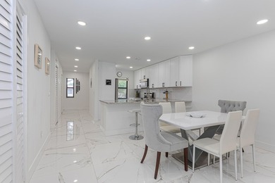 Stunning second-story condo in the prestigious Boca Lago Golf & on Boca Lago Golf and Country Club in Florida - for sale on GolfHomes.com, golf home, golf lot