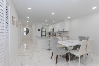 Stunning second-story condo in the prestigious Boca Lago Golf & on  in Florida - for sale on GolfHomes.com, golf home, golf lot