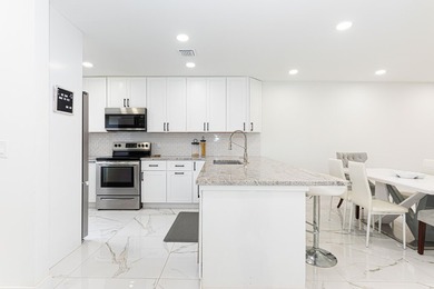 Stunning second-story condo in the prestigious Boca Lago Golf & on Boca Lago Golf and Country Club in Florida - for sale on GolfHomes.com, golf home, golf lot