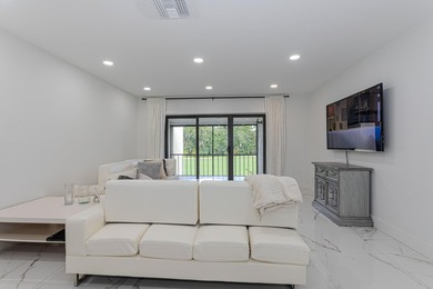 Stunning second-story condo in the prestigious Boca Lago Golf & on Boca Lago Golf and Country Club in Florida - for sale on GolfHomes.com, golf home, golf lot