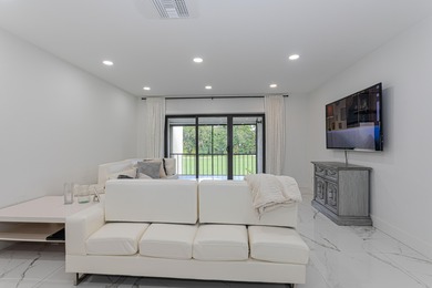 Stunning second-story condo in the prestigious Boca Lago Golf & on  in Florida - for sale on GolfHomes.com, golf home, golf lot