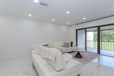 Stunning second-story condo in the prestigious Boca Lago Golf & on Boca Lago Golf and Country Club in Florida - for sale on GolfHomes.com, golf home, golf lot