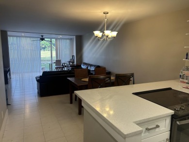 4539 Luxemburg Court 104 on Fountains Golf and Country Club in Florida - for sale on GolfHomes.com, golf home, golf lot