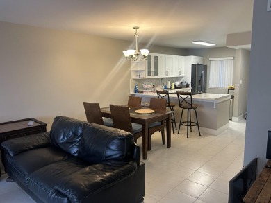 4539 Luxemburg Court 104 on Fountains Golf and Country Club in Florida - for sale on GolfHomes.com, golf home, golf lot