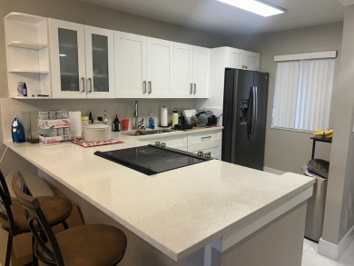 4539 Luxemburg Court 104 on Fountains Golf and Country Club in Florida - for sale on GolfHomes.com, golf home, golf lot