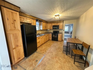 Nestled in the heart of Anaconda, this cozy 2-bedroom, 1-bath on The Old Works Golf Course in Montana - for sale on GolfHomes.com, golf home, golf lot