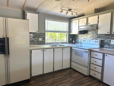 2-BEDROOM, 2-BATHROOM HOME IN GOLF COMMUNITY, ANGLERS GREEN on Anglers Green Golf Course in Florida - for sale on GolfHomes.com, golf home, golf lot