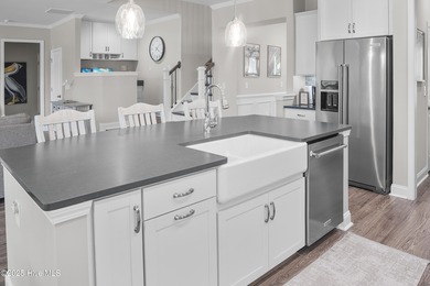 Experience refined coastal living with the Vanderbilt floor plan on Crow Creek Golf Club in North Carolina - for sale on GolfHomes.com, golf home, golf lot