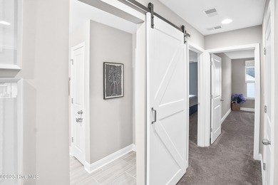 Experience refined coastal living with the Vanderbilt floor plan on Crow Creek Golf Club in North Carolina - for sale on GolfHomes.com, golf home, golf lot