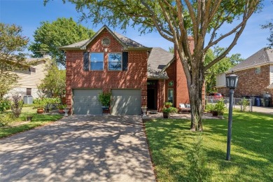 Charming two-story traditional on a deep lot, backing up to on Mesquite Municipal Golf Course in Texas - for sale on GolfHomes.com, golf home, golf lot