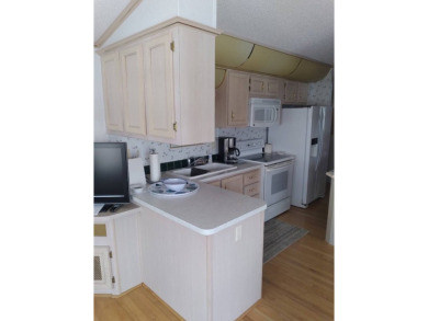 Furnished Park Model on large corner lot with shed and spacious on Deer Creek RV Golf Resort in Florida - for sale on GolfHomes.com, golf home, golf lot