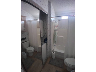 Furnished Park Model on large corner lot with shed and spacious on Deer Creek RV Golf Resort in Florida - for sale on GolfHomes.com, golf home, golf lot