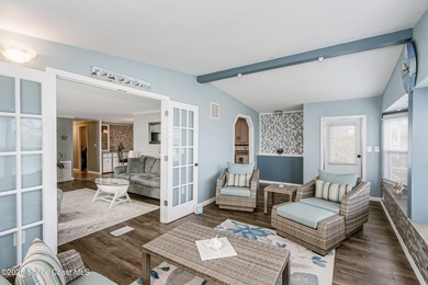 Immaculate and exquisitely updated 2-bedroom, 2-bathroom retreat on Barefoot Bay Golf Course in Florida - for sale on GolfHomes.com, golf home, golf lot