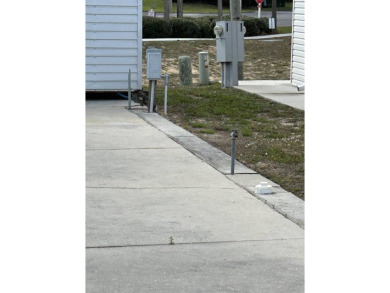 Furnished Park Model on large corner lot with shed and spacious on Deer Creek RV Golf Resort in Florida - for sale on GolfHomes.com, golf home, golf lot
