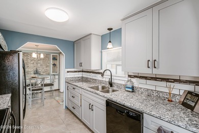 Immaculate and exquisitely updated 2-bedroom, 2-bathroom retreat on Barefoot Bay Golf Course in Florida - for sale on GolfHomes.com, golf home, golf lot