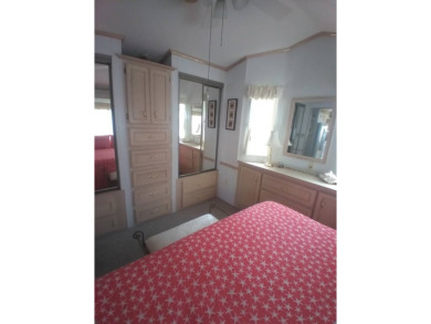 Furnished Park Model on large corner lot with shed and spacious on Deer Creek RV Golf Resort in Florida - for sale on GolfHomes.com, golf home, golf lot