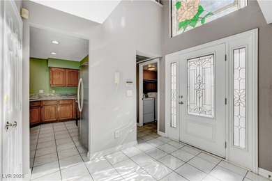 This 2-story home is located in Painted Desert, a guard-gated on Painted Desert Golf Club in Nevada - for sale on GolfHomes.com, golf home, golf lot