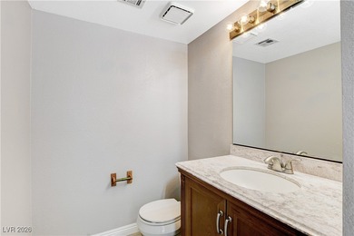 This 2-story home is located in Painted Desert, a guard-gated on Painted Desert Golf Club in Nevada - for sale on GolfHomes.com, golf home, golf lot