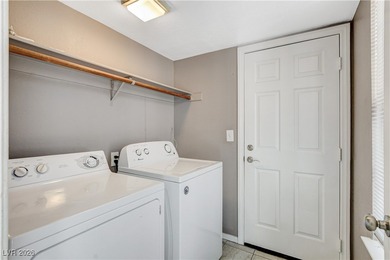 This 2-story home is located in Painted Desert, a guard-gated on Painted Desert Golf Club in Nevada - for sale on GolfHomes.com, golf home, golf lot