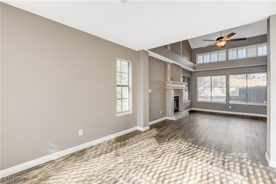 This 2-story home is located in Painted Desert, a guard-gated on Painted Desert Golf Club in Nevada - for sale on GolfHomes.com, golf home, golf lot