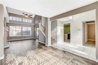 This 2-story home is located in Painted Desert, a guard-gated on Painted Desert Golf Club in Nevada - for sale on GolfHomes.com, golf home, golf lot