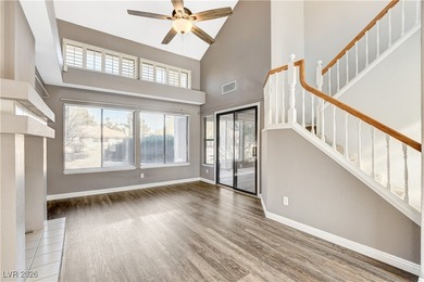 This 2-story home is located in Painted Desert, a guard-gated on Painted Desert Golf Club in Nevada - for sale on GolfHomes.com, golf home, golf lot