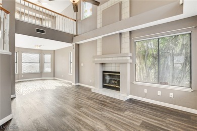 This 2-story home is located in Painted Desert, a guard-gated on Painted Desert Golf Club in Nevada - for sale on GolfHomes.com, golf home, golf lot