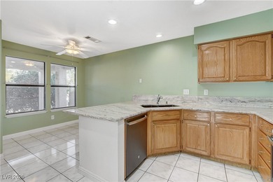 This 2-story home is located in Painted Desert, a guard-gated on Painted Desert Golf Club in Nevada - for sale on GolfHomes.com, golf home, golf lot