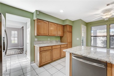 This 2-story home is located in Painted Desert, a guard-gated on Painted Desert Golf Club in Nevada - for sale on GolfHomes.com, golf home, golf lot