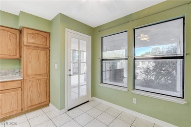 This 2-story home is located in Painted Desert, a guard-gated on Painted Desert Golf Club in Nevada - for sale on GolfHomes.com, golf home, golf lot