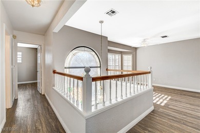 This 2-story home is located in Painted Desert, a guard-gated on Painted Desert Golf Club in Nevada - for sale on GolfHomes.com, golf home, golf lot